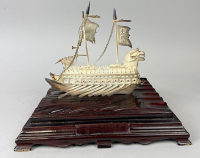 Lot 199 - A CHINESE OR KOREAN SILVER OR SILVERED METAL JUNK SHIP