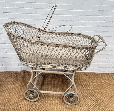 Lot 1083 - AN EARLY 20TH CENTURY CANE PAINTED CRIB