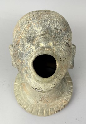 Lot 553 - A WEST AFRICAN TERRACOTTA SCULPTURE OF A MAN WITH MOUTH OPEN
