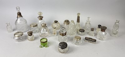 Lot 281 - A COLLECTION OF ANTIQUE GLASS AND CRYSTAL BOTTLES, INCLUDING MANY WITH SILVER MOUNTS