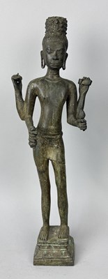 Lot 62 - A CAMBODIAN OR THAI CAST BRONZE DEITY, FORMERLY IN THE SIR CHRISTOPHER ONDAATJE COLLECTION