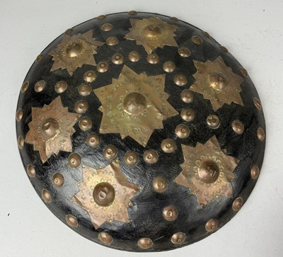 Lot 48 - AN INDONESIAN SHIELD OR BUCKLER, WOOD WITH APPLIED BRASS ORNAMENTATION, ACEH, SUMATRA, INDONESIA CIRCA 1900
