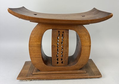 Lot 51 - AN UNUSUALLY LARGE TRIBAL ASHANTI STOOL, GHANA, CIRCA 1920