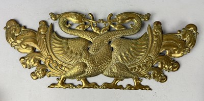 Lot 83 - AN INDIAN OR SRI LANKAN BRASS PLAQUE OF TWO ADDORSED SACRED SWANS, SOUTH INDIA OR SRI LANKA, 19TH CENTURY