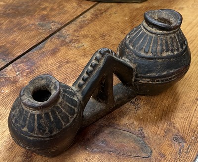 Lot 79 - A NEPALESE OR TIBETAN CARVED WOODEN YAK BUTTER CONTAINER, NEPAL, 18TH/19TH CENTURY