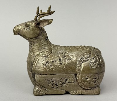 Lot 109 - A CAMBODIAN SILVER ALLOY BETEL BOX IN THE FORM OF A RESTING DEER, CAMBODIA, CIRCA 1920