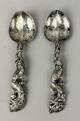 Lot 145 - TWO TIBETAN SILVER MEDICINE SPOONS, THE BOWLS ENGRAVED AND THE HANDLES FORMED AS DRAGONS, TIBET OR SINO-TIBETAN, CIRCA 1900
