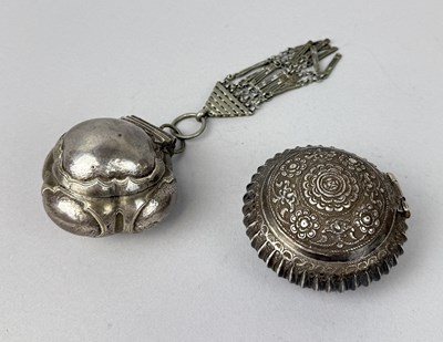 Lot 88 - A MALAY SILVER BETEL BOX AND LIME BOX, MALAYSIA OR INDONESIA, 19TH CENTURY (2)