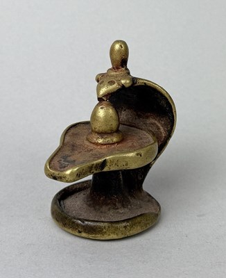 Lot 167 - AN INDIAN BRASS SHIVALINGAM, INDIA, 19TH CENTURY