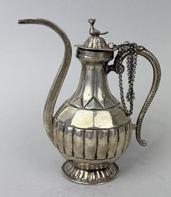 Lot 86 - AN INDIAN MUGHAL SILVER WINE OR OPIUM WATER VESSEL, INDIA, 19TH CENTURY