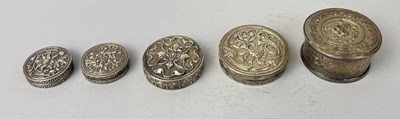Lot 87 - FIVE CIRCULAR CHINESE AND THAI SILVER BOXES, EACH CHASED WITH FLOWER MOTIFS, 19TH-EARLY 19TH CENTURY (5)