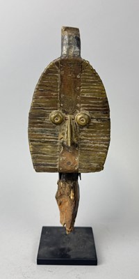 Lot 16 - AN AFRICAN KOTA ANCESTRAL GUARDIAN FIGURE, WRAPPED IN COPPER STRIPS AND WIRE OVER A WOOD BASE