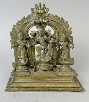 Lot 17 - AN IMPRESSIVE INDIAN BRONZE ALTAR TRIO OF DURGA KILLING THE BUFFALO DEMON AND TWO OTHER DEITIES, SOUTH INDIA, 18TH-19TH CENTURY
