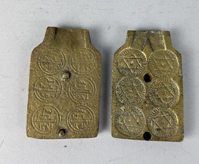 Lot 152 - AN ISLAMIC BRASS COIN MOULD, PROBABLY NORTH AFRICAN, MOROCCO