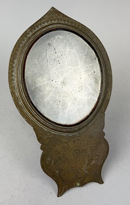 Lot 156 - AN INDIAN RITUAL BRASS MIRROR, SOUTH INDIA, PROBABLY 19TH CENTURY