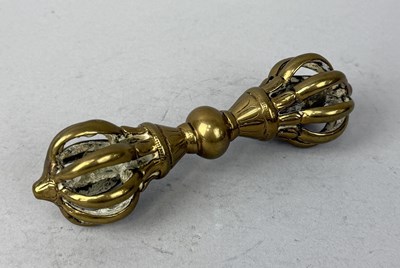 Lot 46 - A TIBETAN CAST BRASS VAJRA, TIBET, CIRCA 17TH CENTURY