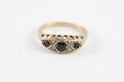 Lot 134 - A 9CT GOLD SAPPHIRE AND DIAMOND ANTIQUE STYLE RING