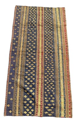 Lot 161 - AN INDONESIAN TEXTILE, WOMAN'S CEREMONIAL SKIRT (TAPIS TUA) FRAGMENT, PUBIAN PEOPLE, LAMPUNG, SOUTH SUMATRA, INDONESIA, CIRCA 1920
