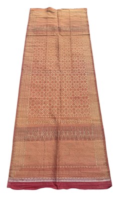 Lot 26 - MALAY ISLAMIC SONGKET TEXTILE OF RED SILK WOVEN WITH GOLD THREAD, SUMATRA OR MALAYSIA, 19TH CENTURY