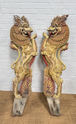 Lot 9 - A PAIR OF LARGE CARVED POLYCHROME WOODEN MYTHICAL LION (YALI) SUPPORTS, PROBABLY FOR A TEMPLE, SOUTH INDIA, 20TH CENTURY