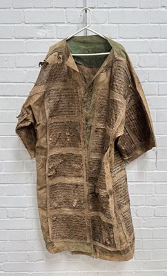 Lot 75 - AN ISLAMIC SUFI DERVISH CLOAK, WITH PANELS OF ATTACHED KORANIC SCRIPTURE APPLIED, PROBABLY NORTH AFRICAN OR EGYPT