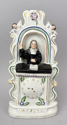 Lot 506 - STAFFORDSHIRE, JOHN WESLEY PREACHING FROM PULPIT ABOVE CLOCK