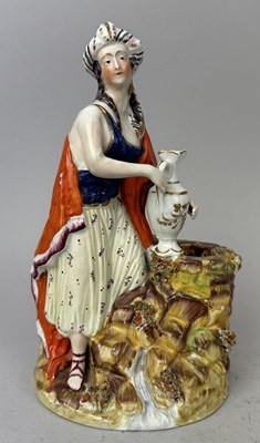 Lot 509 - STAFFORDSHIRE, REBEKAH WITH JUG
