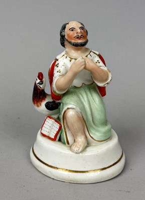 Lot 478 - STAFFORDSHIRE, SAINT LUKE SEATED, CIRCA 1830'S