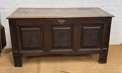 Lot 1088 - AN 18TH CENTURY OAK COFFER WITH CARVED PANELS