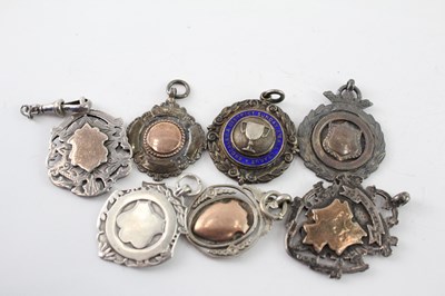 Lot 342 - SEVEN .925 STERLING SILVER FOBS/MEDALLIONS