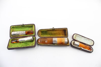 Lot 346 - FOUR .925 STERLING SILVER BANDED CHEROOT HOLDERS