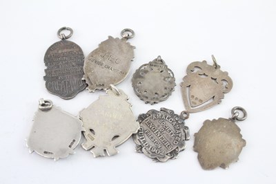 Lot 353 - EIGHT .925 STERLING SILVER FOBS/MEDALLIONS