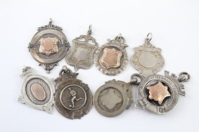 Lot 355 - EIGHT .925 STERLING SILVER FOBS/MEDALLIONS