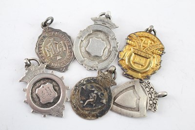 Lot 329 - SIX ANTIQUE .925 STERLING SILVER FOBS/MEDALLIONS