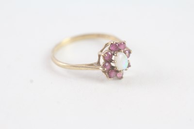 Lot 179 - A 9CT GOLD VINTAGE OPAL AND RUBY CLUSTER RING