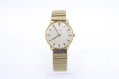 Lot 431 - A GARRARD GOLD-TONE HAND-WOUND WATCH