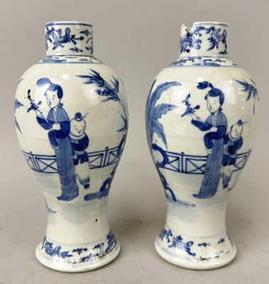 Lot 217B - A PAIR OF 19TH CENTURY BLUE AND WHITE VASES DECORATED WITH FIGURES