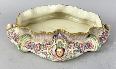 Lot 1158 - A WORCESTER PORCELAIN TROUGH DECORATED WITH FACES AND GILT DETAIL