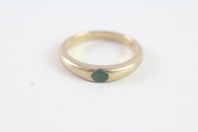 Lot 140 - A 9CT GOLD OVAL CUT EMERALD RING