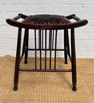 Lot 1099 - A LIBERTY STYLE STOOL WITH KILIM TYPE UPHOLSTERED SEAT