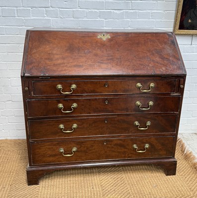 Lot 1101 - A GEORGIAN MAHOGANY BUREAU, SOME LEAD LINED DRAWERS