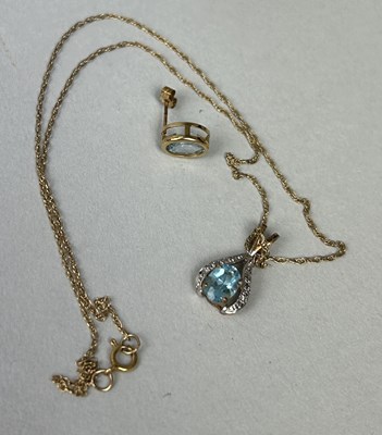 Lot 116 - A 9CT GOLD TOPAZ AND DIAMOND EARRING AND PENDANT SET