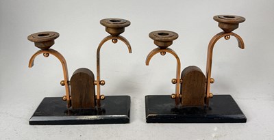 Lot 597 - A PAIR OF ART DECO COPPER CANDLESTICKS
