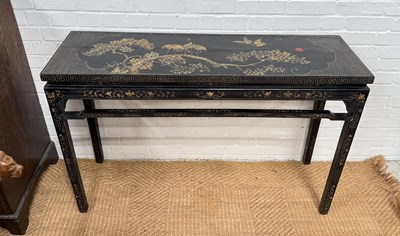 Lot 987 - A CHINOISERIE BLACK LACQUERED AND GILT ALTAR TABLE / CONSOLE TABLE, DECORATED WITH CRANES