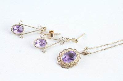 Lot 168 - A 9CT GOLD AMETHYST DROP EARRINGS AND PENDANT SET