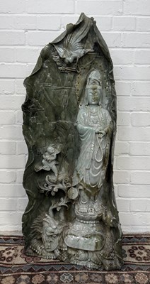 Lot 209 - A VERY LARGE CHINESE JADE OR JADEITE FIGURE OF A GUANYIN