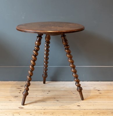 Lot 976 - A 19TH CENTURY CRICKET TABLE WITH THICK TOP AND BARLEY TWIST LEGS