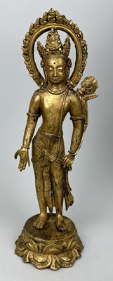 Lot 627 - A GILT BRONZE BUDDHIST SCULPTURE DEPICTING AVALOKITESUARA