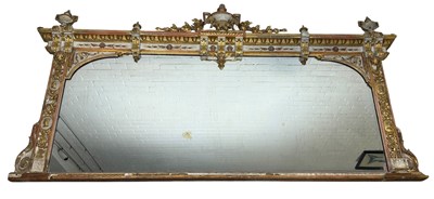 Lot 1021 - A LARGE FRENCH NEOCLASSICAL GILT WOOD WALL MIRROR WITH CLASSICAL URNS, ROUNDELS, MUSICAL INSTRUMENTS