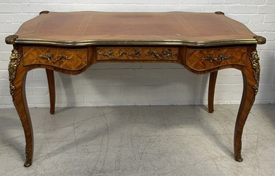 Lot 1052 - A FRENCH LOUIS XVI STYLE WRITING DESK WITH BRONZE MOUNTS AND TOOLED LEATHER TOP